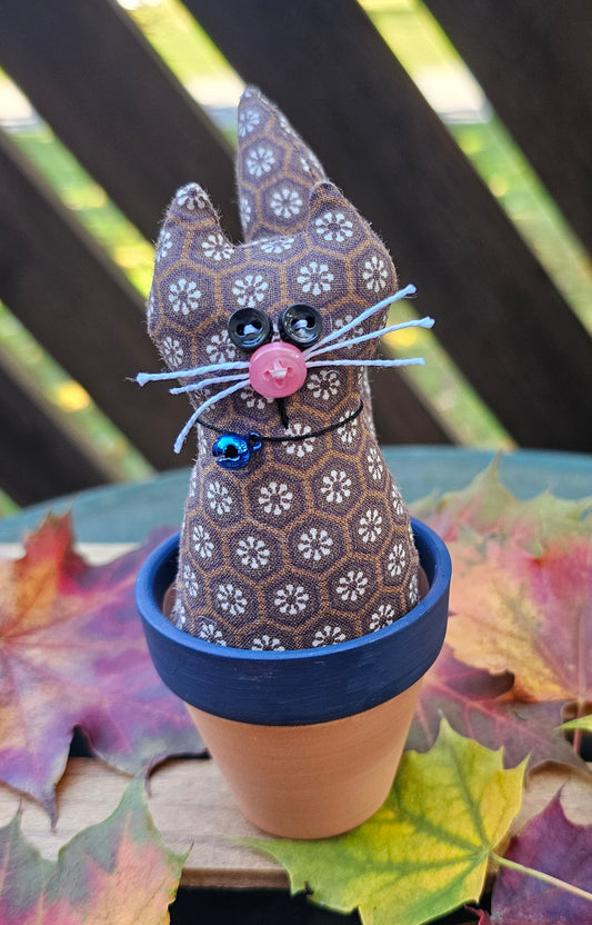 Brown Kitty in a Pot