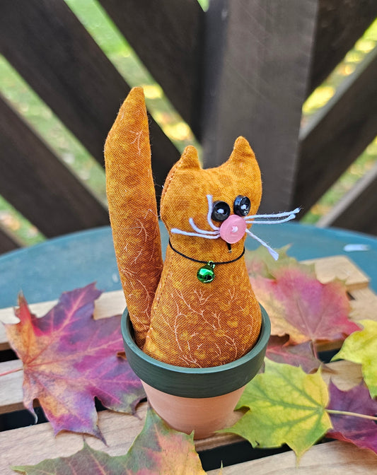Orange Kitty in Pot
