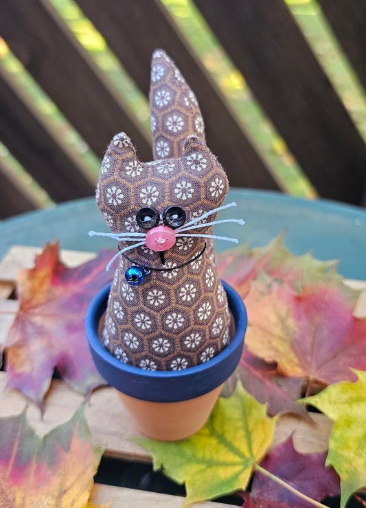 Brown Kitty in a Pot