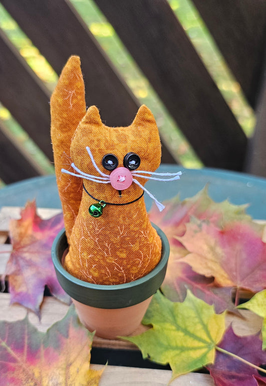 Orange Kitty in Pot