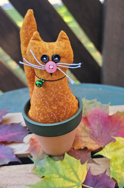 Orange Kitty in Pot