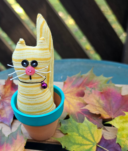 Yellow Striped Kitty in a Pot