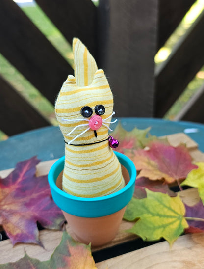 Yellow Striped Kitty in a Pot